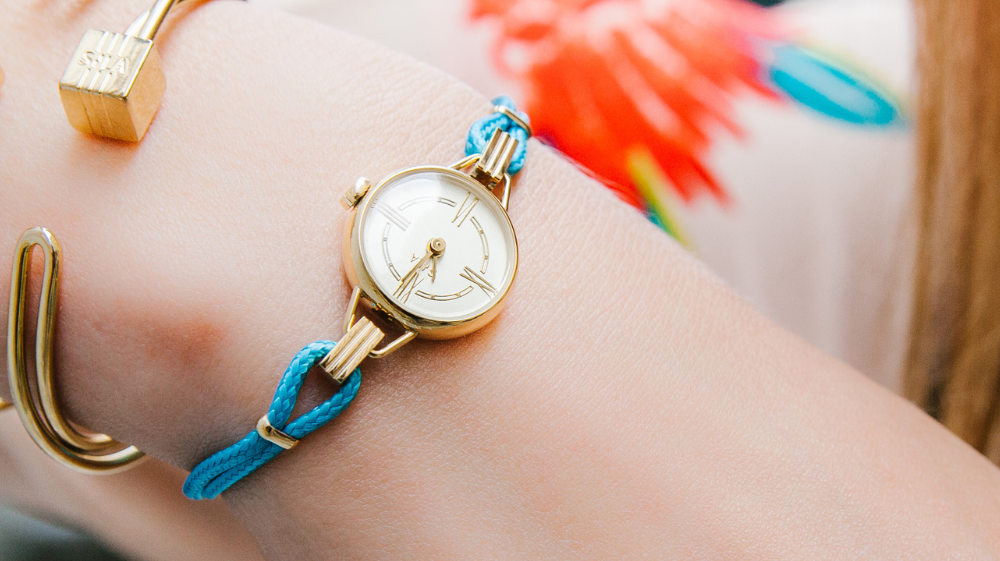 sila lifestyle montre or jaune bracelet coton turquoise